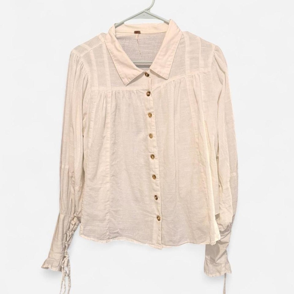 Free People White blouse with lace up detail on sleeves